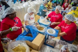 Wells Fargo Bank was among the companies that sponsored teams that packed meals at Food For The Poor's Join The Pack event on June 4 at Advent Lutheran Church in Boca Raton. Photo/Food For The Poor