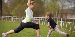 mom working out with son-slider